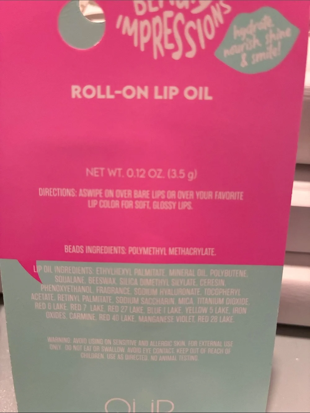 Impressions Roll-On Lip Oil Duo with Teal & Orange Caps